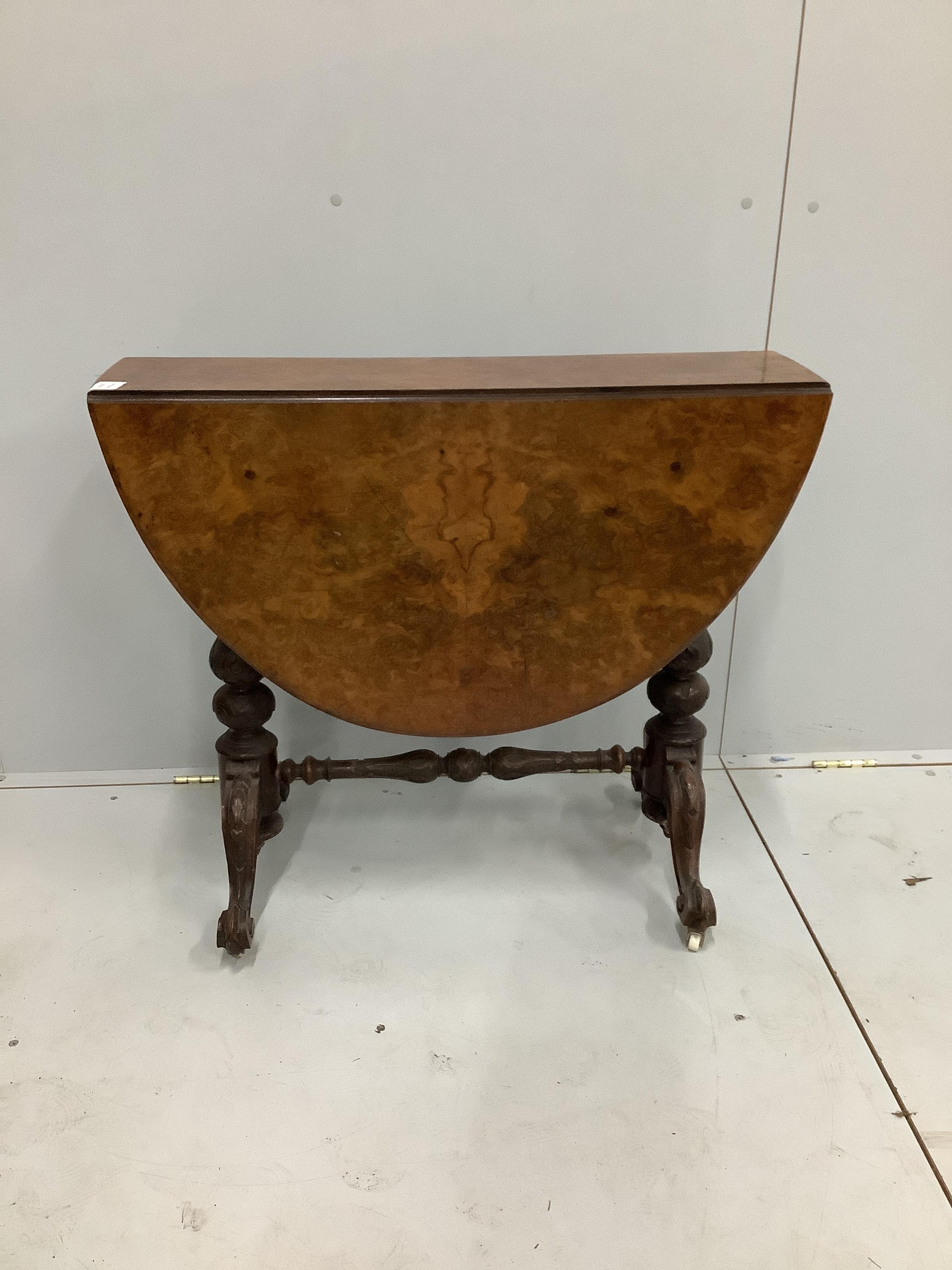 A Victorian burr walnut Sutherland table, width 84cm, height 73cm